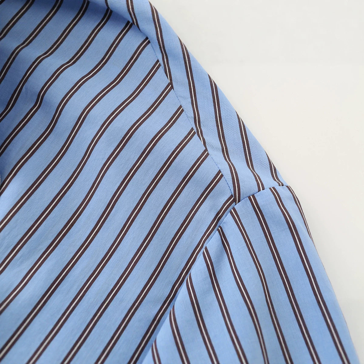 Bow tie tied long sleeved striped shirt for women