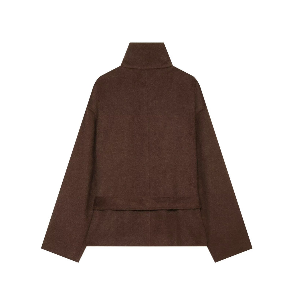 Wearing a long sleeved woolen jacket with a belt for women